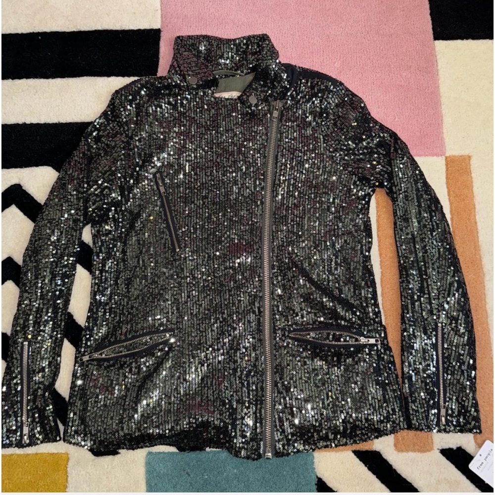 Free people gunmetal motorcycle jacket  new 
Limited edition, no longer sold